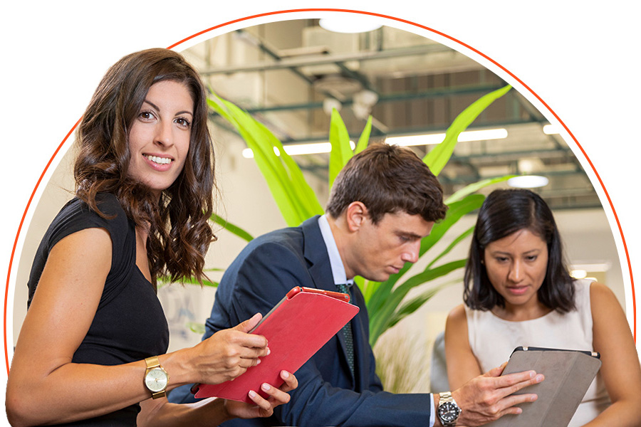 woman-posing-with-tablet-office ma